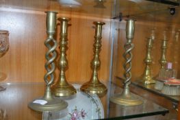 Two Pairs of Brass Candlesticks
