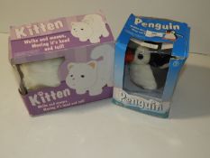 *Toy Kitten and a Stuffed Penguin