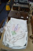 Basket of Hand Sewn Linens and a Sewing Box
