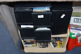 Small Television Stand with a Collection of CD and