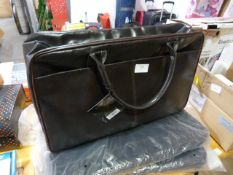 Three Aramis Carry On Bag