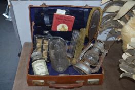 Vintage Leather Briefcase Containing an Assortment