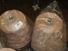 *Four Rolls of Salmon Coloured Metallic Knitting Y