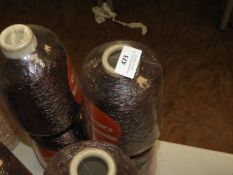 *Four Cones of Metallic Yarn