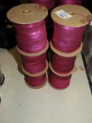 *Six Rolls of Purple Sequins