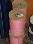 Four Rolls of Pink Knitting Yarn
