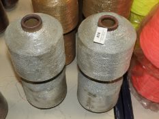 *Four Cones of Metallic Yarn