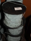 *Four Rolls of Pale Blue Braided Thread