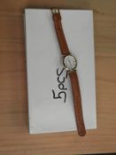 *Box Containing 10 Wristwatches with Roman Numeral