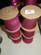 *Six Rolls of Purple Sequins