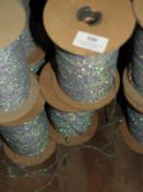 *Four Rolls of Iridescent Sparkly Thread