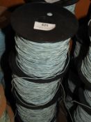 *Four Rolls of Pale Blue Braided Thread