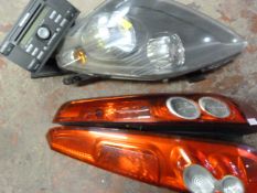 Car Radio/CD Player, PR Rear Lights and a Headligh