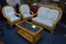 Three Piece Rattan Suite; Three Seat Sofa, Two Arm