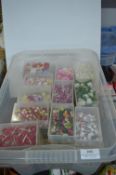 Large Tub of Small Containers Containing Decorativ