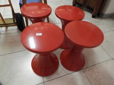 Four Red Stools