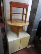 *Metal Cabinet, Circular Table, and a Stool