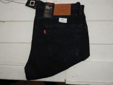 *Levi 502 Regular Taper Jeans Size: 34/30