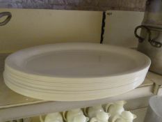 Thirteen Large Oval White Plastic Trays