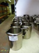 Eleven Stainless Steel Milk Jugs