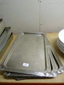 Five Stainless Steel Trays