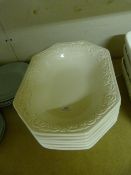 Six Octagonal White China Dishes