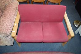 Small Burgundy Two Seat Wood Framed Sofa