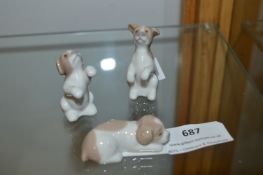 Three Miniature Lladro Figures of Puppies