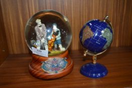 Snow Globe and a Terrestrial Globe