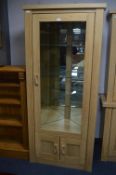Mirrored Back Corner Unit in Light Oak Finish