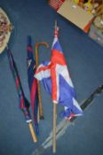 Umbrellas, Walking Stick and Union Jack Flag