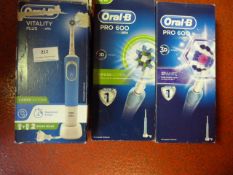 Three Oral-B Electric Toothbrushes