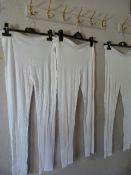 Three Pairs of White Leggings