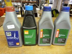 Four Bottles of Part Used Chainsaw Oil