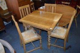 Extending Oak Dining Table with Four Matching Chairs on Barley Twist Legs