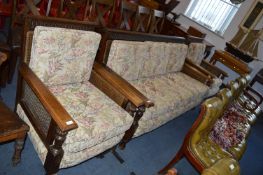 Carved Oak Berge Three Piece Suite; Two Armchairs and a Three Seat Sofa