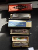 Three Harmonicas in Original Boxes