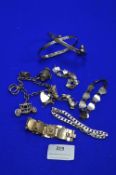 Quantity of Silver Bracelets and Charms