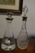 Two Glass Wine Decanters with Silver Tops