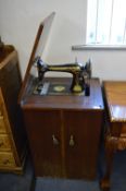 Singer Sewing Machine in a Cabinet