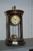 Pendulum Clock with Brass Pendulum and Four Columns