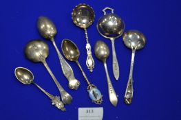 Silver Teaspoons and Strainers etc.