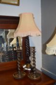 Turned Mahogany Barley Twist Table Lamp and a Pair of Candlesticks
