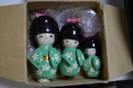 Three Kokeshi Dolls