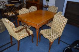 Extending Dining Table and Six Upholstered Dining
