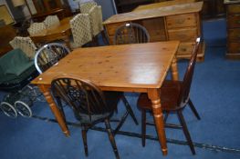 Pine Kitchen Table and Assorted Chairs