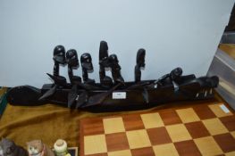 African Carved Ebony Boat Containing Carved Figure
