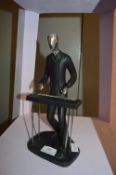 Figure of a Keyboard Player