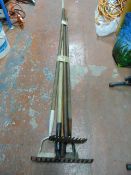 Bundle of Rakes, Hoes and a Window Hook