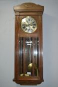 Wall Clock with Oak Case and Bevelled Glass Front